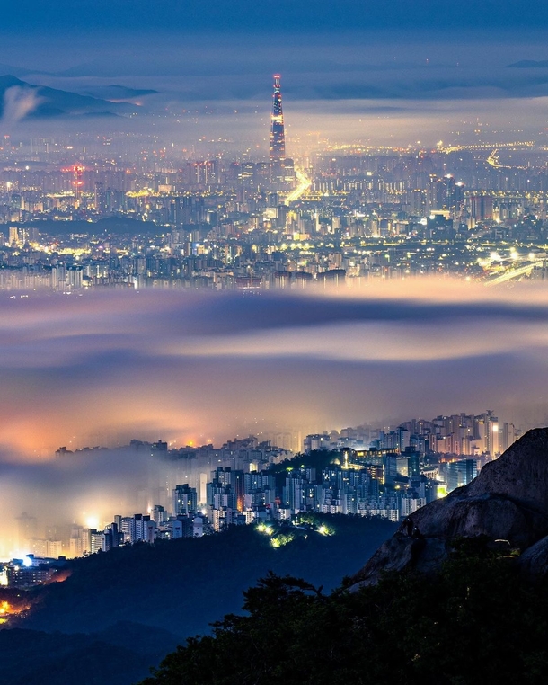 Cityscape under a sea of clouds Seoul South Korea
