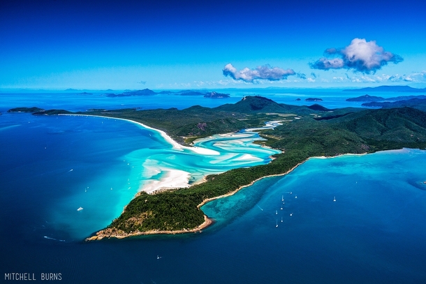 Clear water and white sands of Whitsunday Island Australia  Photo by Mitchell Burns
