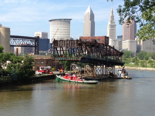 Cleveland - Historic lift bridge span cut away and floating down the Cuyahoga River x