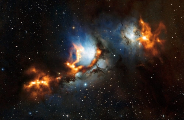 Clouds of cosmic dust threaded through the reflection nebula Messier  like a string of pearls