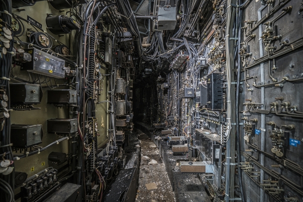 Computer wiring tunnel inside an abandoned coal power plant   By Bryan Buckley
