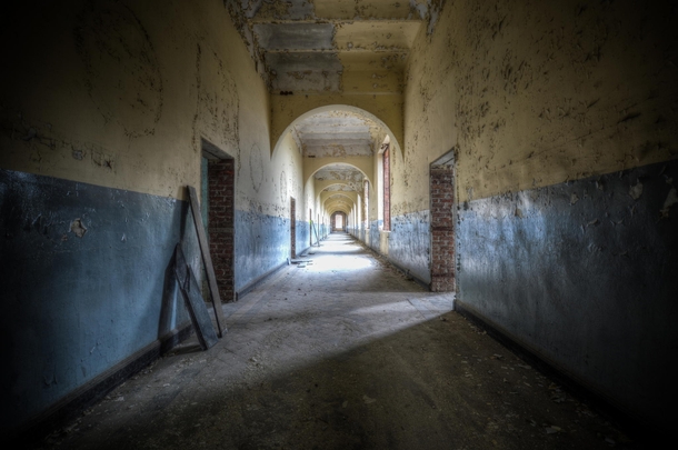 Corridor  a decaying hallway in Belgium  by Klare Sherwood