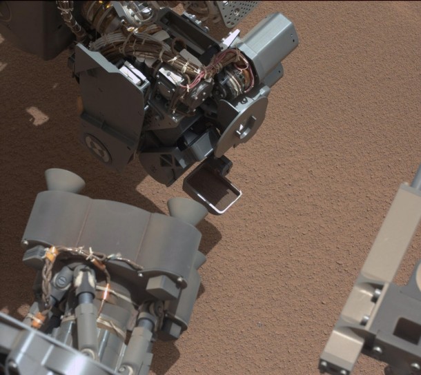 Curiosity rover spots bright object in sand at X-Y coordinate - in image possible screw from rover fell out from arm at X-Y coordinate - NASA is pausing Curiosity to gather more data 