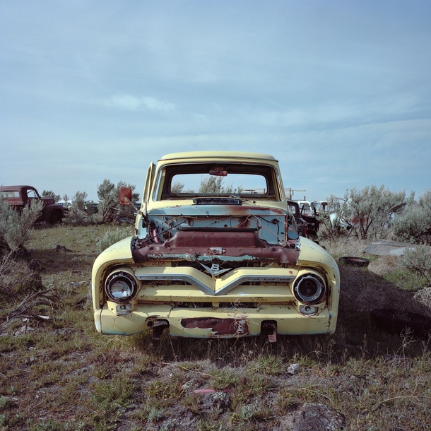 Derelict  ford F pickup seen in a high desert junkyard somewhere in idaho By eyetwist 
