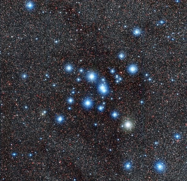 Diamonds in the Tail of the Scorpion NGC  a brilliant cluster of about  stars located some  light-years from Earth 