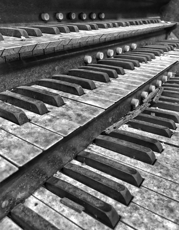 Dirty old organ keys in an abandoned church St Louis MO