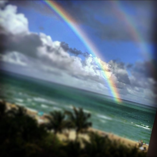 Dont know if this is where this belongs but its the end of a double rainbow in the ocean
