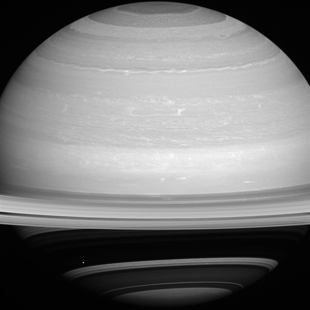 Dot Against the Dark New Cassini Image of Saturn with Mimas 