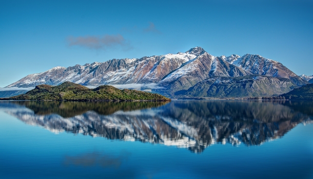 Driving to Glenorchy New Zealand and there was a good reflection of Pig Island in Lake Wakatipu 