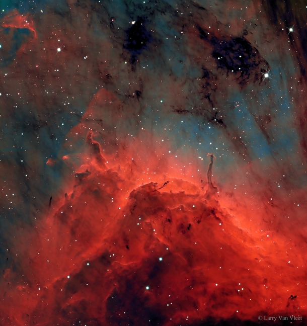 Dust pillars and jets from young stars in the Pelican Nebula visible near the constellation Cyngus 
