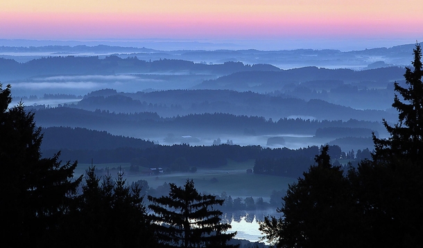 Early morning fog over the valleys near Bernbeuren southern Germany 