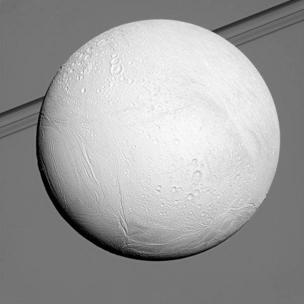 Enceladus in front of Saturns rings Cassini imaging 