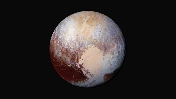 Enhanced color image of Pluto used detect differences in the composition and texture of Plutos surface New Horizons LORRI and Ralph 