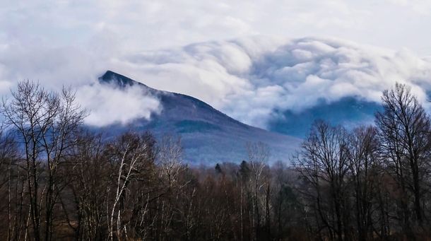 Fog rolling over Mount Mansfield Vermont 