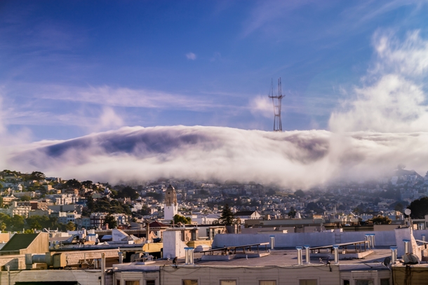 Fog rolling over Twin Peaks San Francisco California 