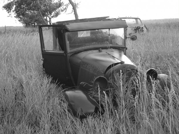 Ford Model A in a hayfield  
