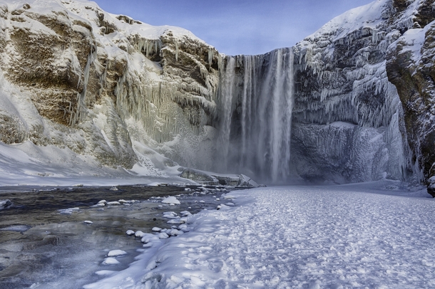 Freezing Skogafoss Iceland  Photo by Peter Negatsch xpost from rIsland