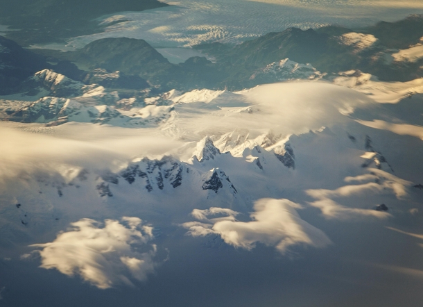 From mountains to sea Flying somewhere over Patagonia  Id love to know what peakrange this is