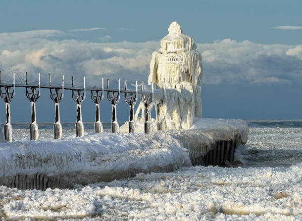 Frozen St Joseph North Pier Lighthouse in St Joseph Michigan  Info in comments