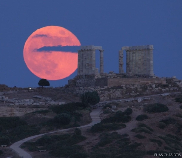 Full Moon over the temple of Poseidon the  year-old ancient temple in Cape Sounion Credit Elias Chasiotis