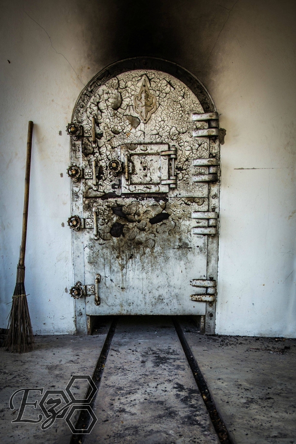Furnace door in an abandoned Thai crematorium 