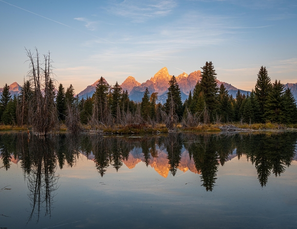Grand Tetons USA from Schwabacher Landing Taken in October  on a morning when wildfire smoke was less prominent leaving the landscape largely devoid of haze  Instagram in comments
