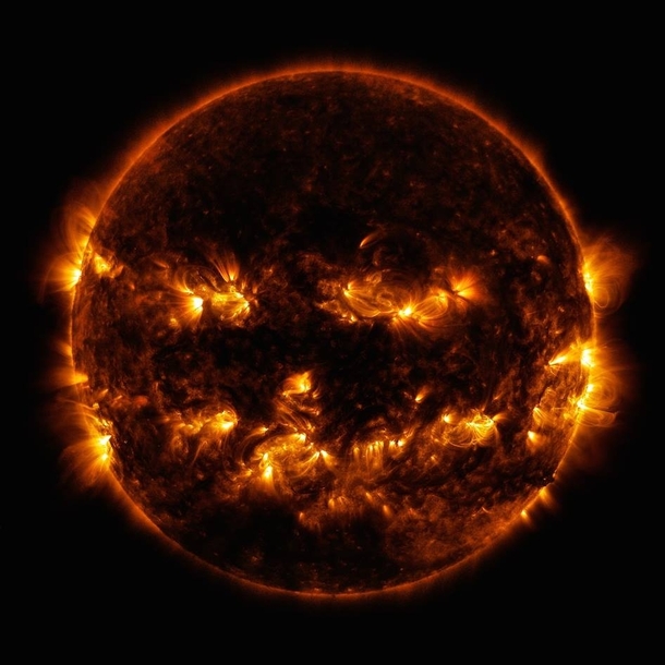 Happy Halloween Heres the Jack-o-Lantern Sun seen by the NASA Solar Dynamics Observatory Little SDO on Oct  