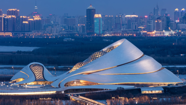 Harbin Opera House in China was designed to mirror the sinuous curves of the marsh landscape with an exterior of smooth white aluminium panels and glass