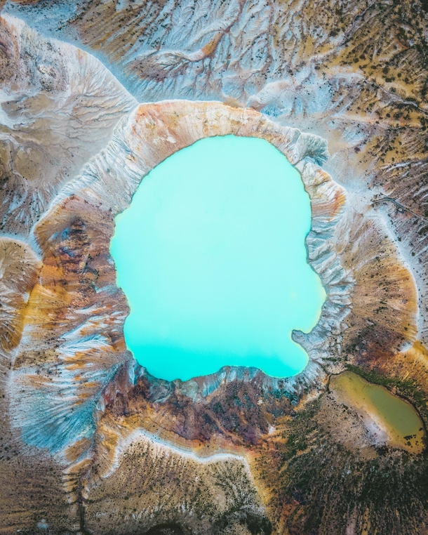Have you seen a teal lake on top of the mountain Volcanic lake Japan 