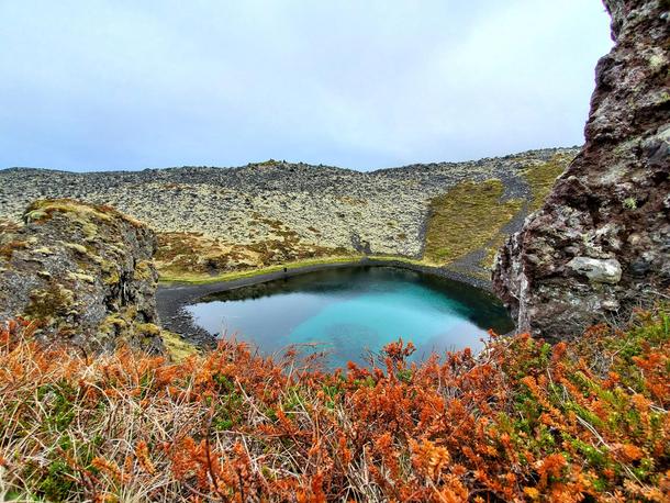 Hidden Turquoise Lake at Djpalnssandur Iceland 