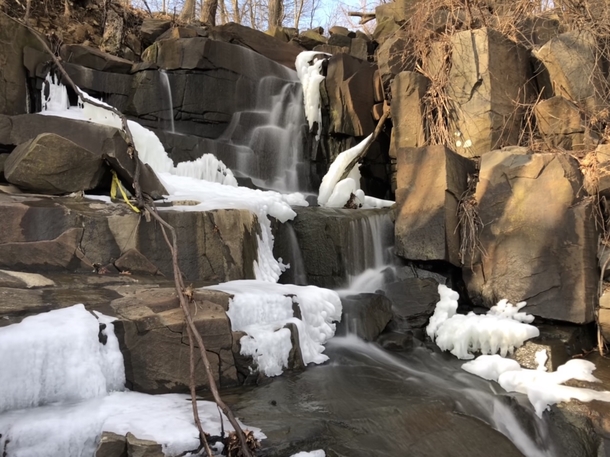Hiking with a breathless view of a wintry flowing waterfall - Palisades Interstate Park Englewood Cliffs part NJ 