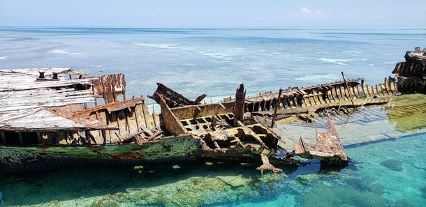 HMAS Protector an Australian gunboat built in the late th century lies off Heron Island in the Great Barrier Reef 