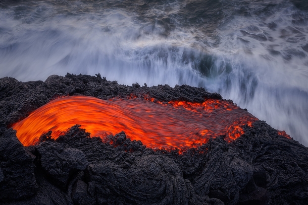 Hot lava action in Hawaii Volcano National Park by Tom Kualii 