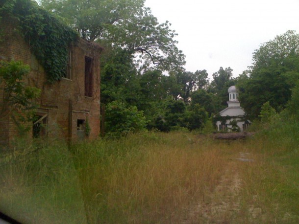 House and church in abandoned town 
