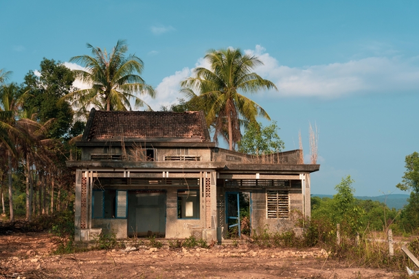 House being reclaimed by nature on Phu Quoc Island Vietnam