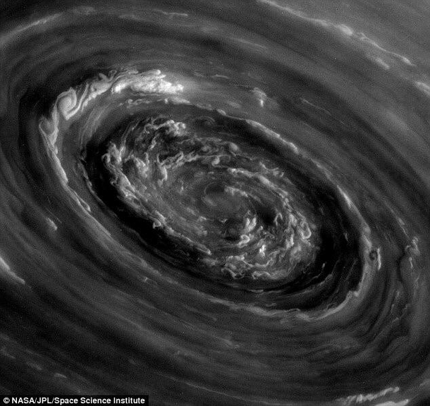 Hurricane Saturn Dramatic storm cloud at planets north pole captured by NASA satellite