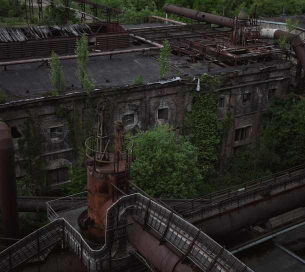 I love how nature grows back in the untouched part of the abandoned steel factory Vlklinger Htte Germany 