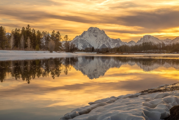 I slipped while climbing down the riverbank here at Oxbow Bend last weekend in Grand Teton National Park didnt drop my camera thankfully I thought I was a goner and the heavenly view made me wonder if I had died and gone to heaven 