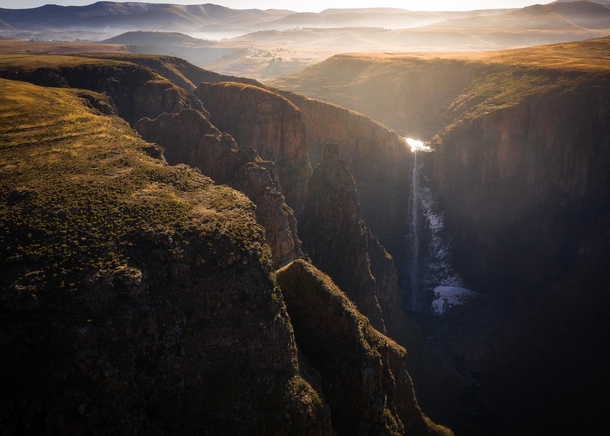 I spent a freezing night sleeping in my rental car a tiny village in Lesotho in order to take this picture in the morning light x OC SkyPacking