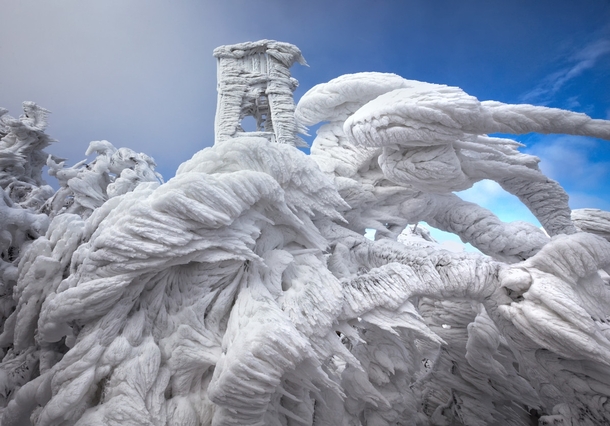 Ice formations on trees and a watchtower on Mount Javornik Slovenia Photo by Marko Korosec  x-post rSloveniaPics