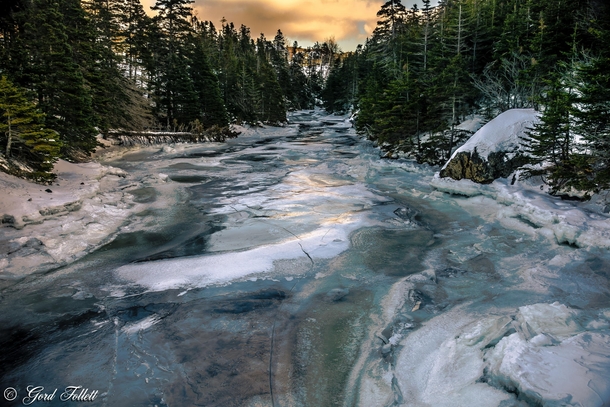 Icy river St Philips Newfoundland Canada  by Gord Follett