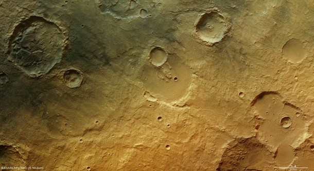 In the ancient cratered southern highlands of Mars the faint traces of a wet past are seen in the form of channels fluidised debris around craters and blocks of eroded sediments 