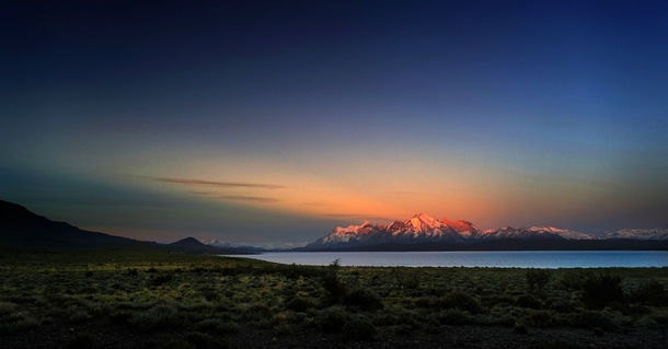 In the distance an extraordinarily beautiful morning begins with a sunrise over Torres del Paine National Park in Chile  Photo by Marko Erman