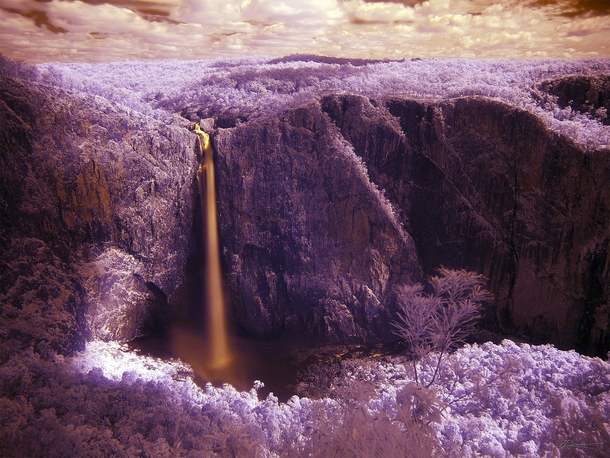 Incredible infrared shot of Wallaman Falls in Queensland Australia  photo by Paul Bica x-post rInfraRedPorn