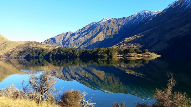 Incredibly calm and peaceful day at Moke Lake just outside of Queenstown New Zealand 