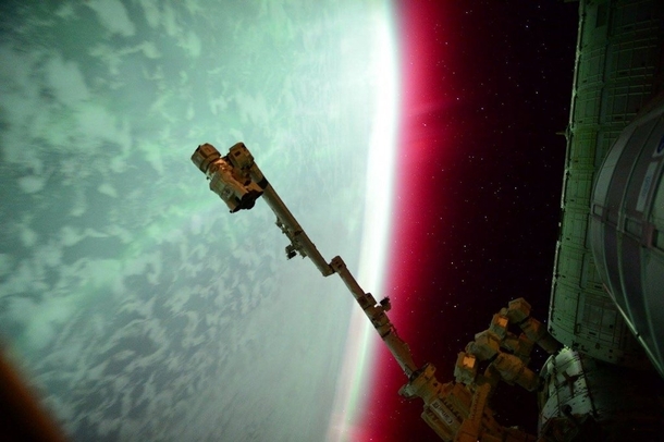 International Space Station captured the planet Earths green auroral display amp rarer reddish band that began during a geomagnetic storm About  km above Earththe orbiting ISS was itself within the realm of the auroral display CreditScott Kelly Expedition