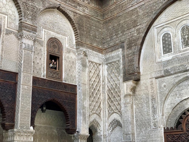 Intricate details at Al-Attarine Madrasa in Fes Morocco 