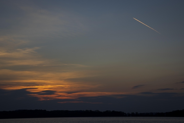 Jet streaking over a calm WI sunset 