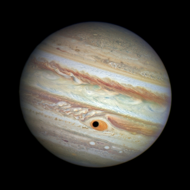 Jupiter is looking at you The shadow of Ganymede swept across the Great Red Spot 