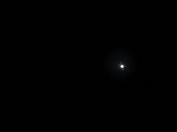 Jupiter with its most visible moons Taken with a Celestron Omni XLT using my phone
